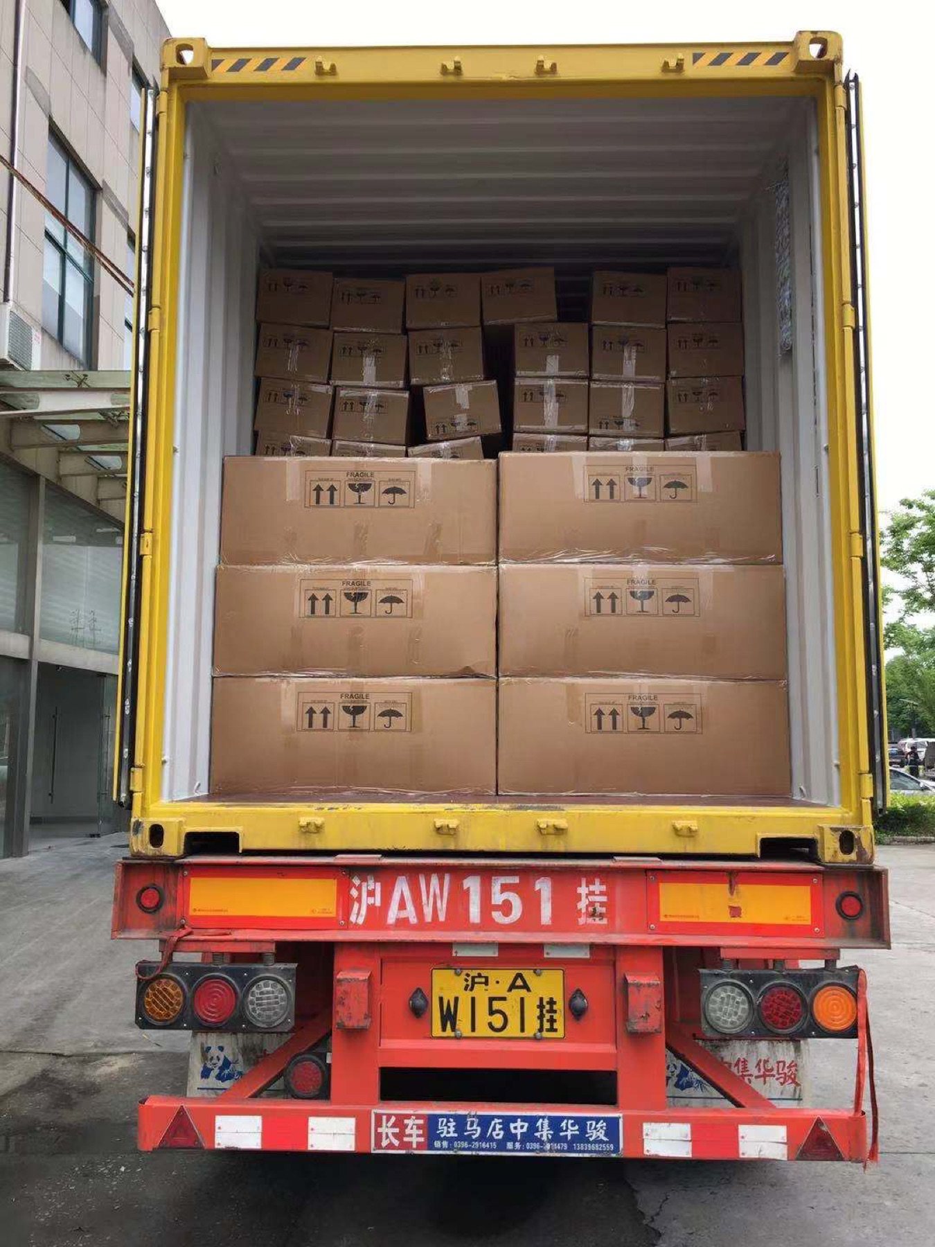 Packed sofa cartons loaded into an export container