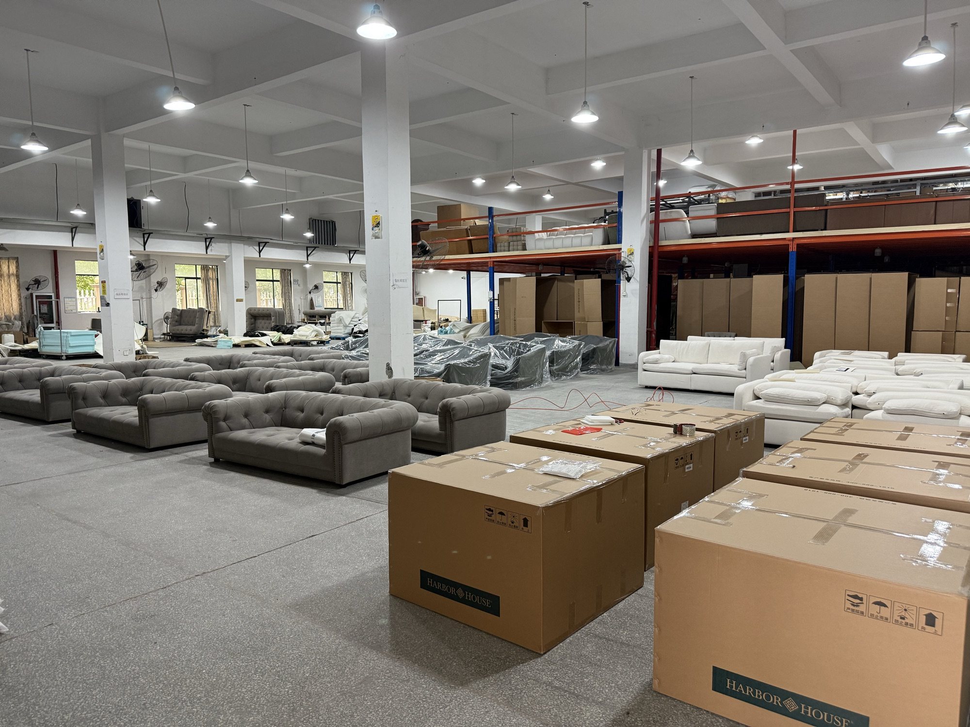 Finished sofa and packaging area during factory inspection